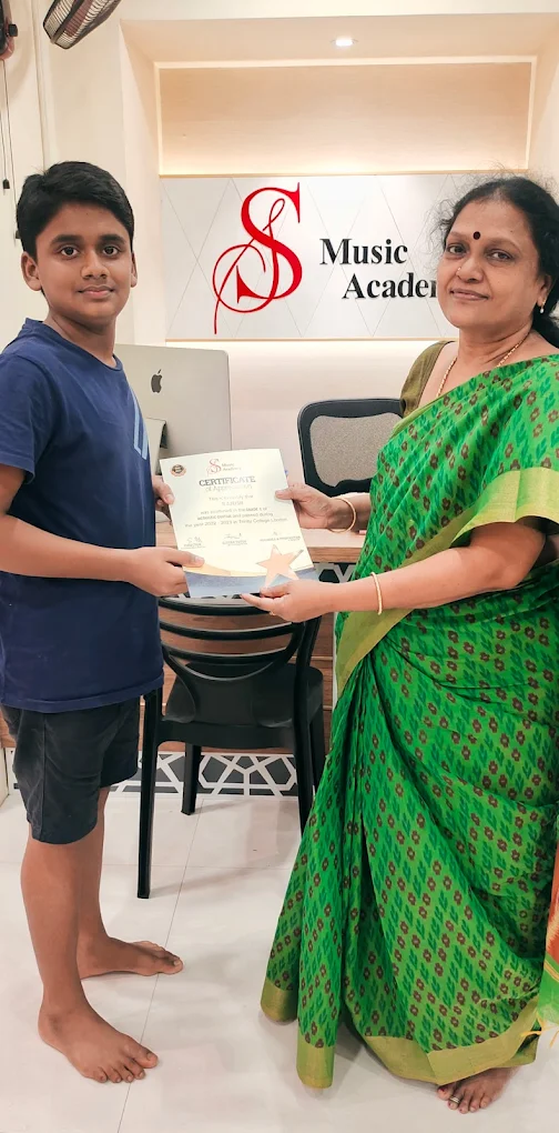 Indian man playing piano